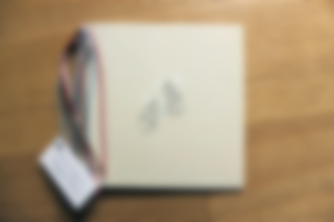 Open book showing two small sketches on a blank page.